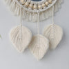 Miroir rond en macramé pour mur, avec des pompons et des franges de couleur crème