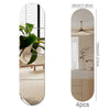 A vertical acrylic mirror wall sticker featuring a plant and a modern kitchen vanity with a ceiling fan.
