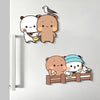 A set of kawaii panda fridge magnets featuring a large brown panda, a white panda, and a small bird.