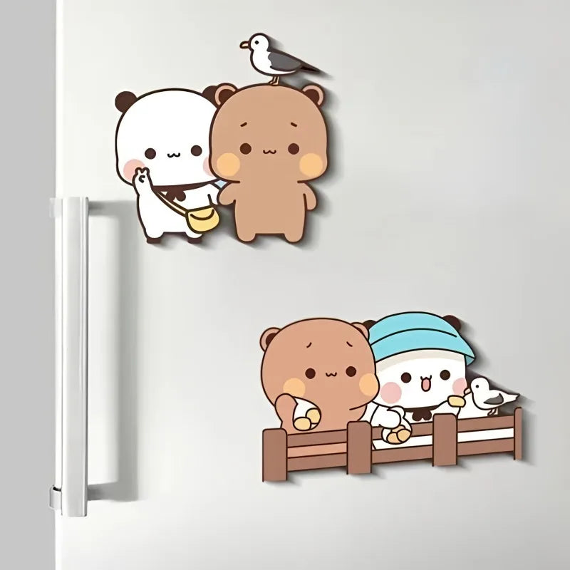 A set of kawaii panda fridge magnets featuring a large brown panda, a white panda, and a small bird.