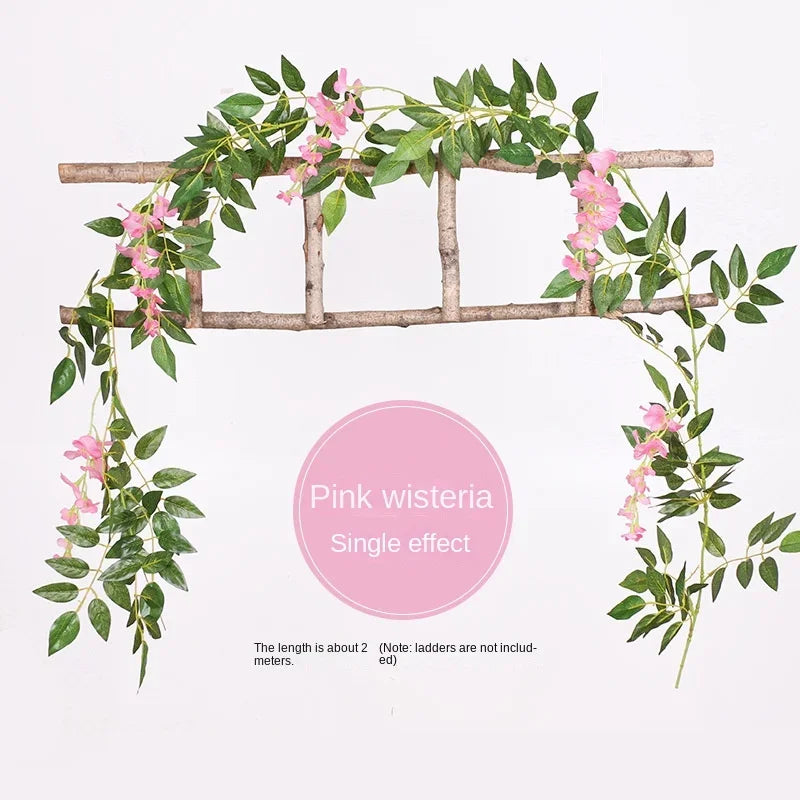 Pink wisteria vine garland draped over a wooden trellis for wedding and home decor