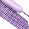 A close-up of purple magic twisting balloons arranged in a bundle.