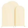 A set of three cream-colored arch stands or backdrops for wedding and event decor.