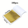 A sheet of edible gold leaf flakes for baking and cake decoration shown in an open white package.