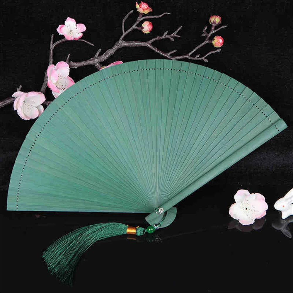 Traditional Bamboo Folding Fan with Solid Color Design