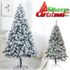 Flocked artificial Christmas tree covered in snow with realistic branches