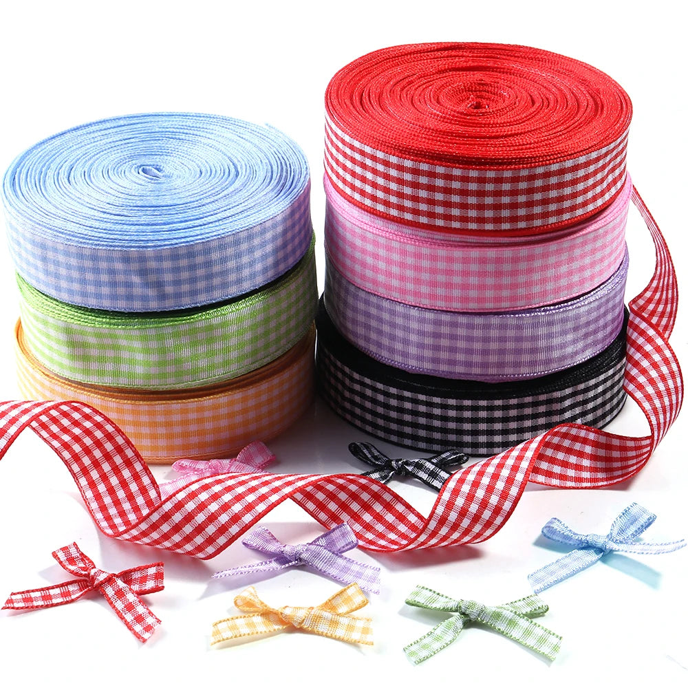 Rolls of red, pink, blue, and green gingham ribbon for gift wrapping and party decor