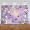 A dreamy purple butterfly photo backdrop featuring hanging lanterns and floral elements for events.