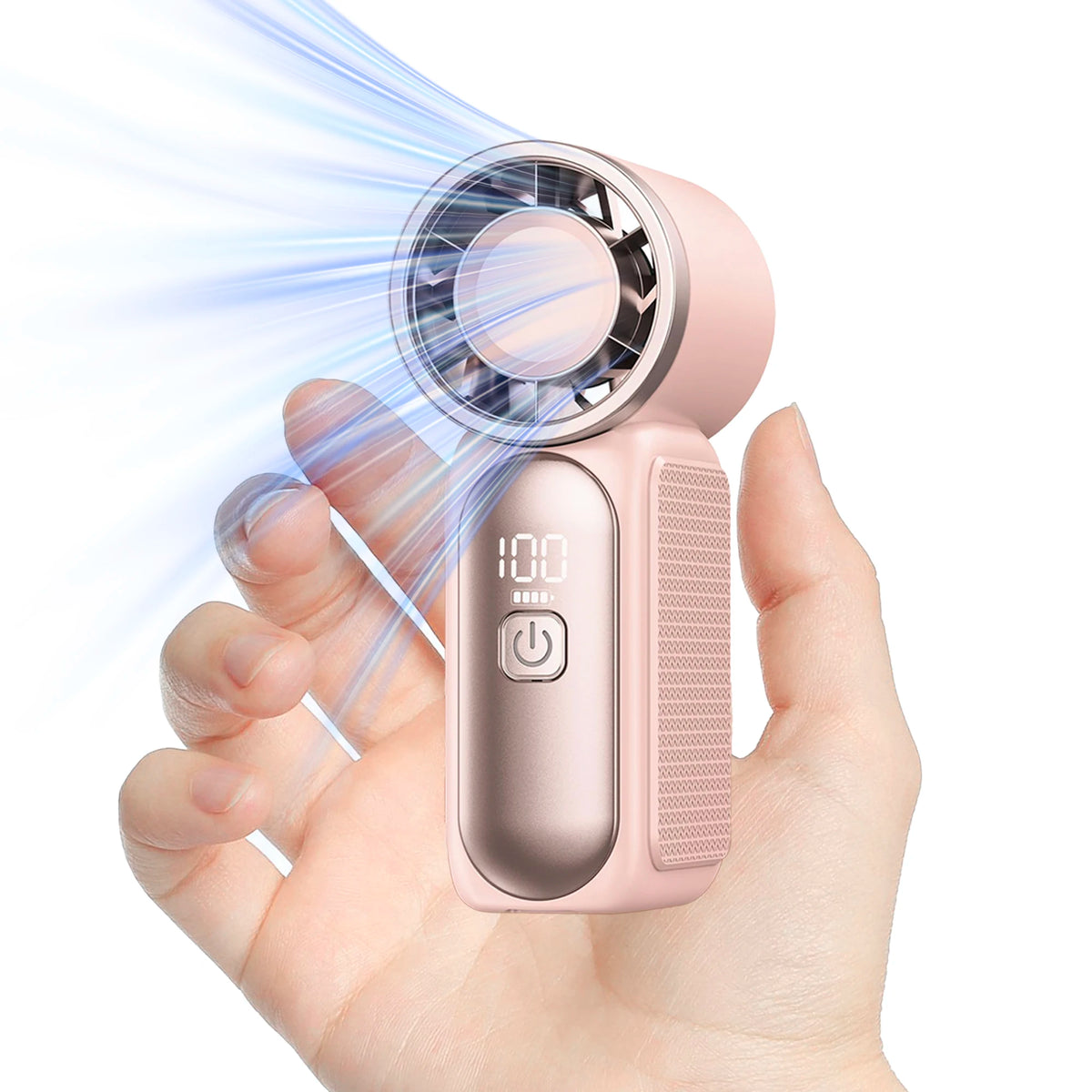 A hand holds a pink portable handheld cooling fan, demonstrating a strong stream of air.