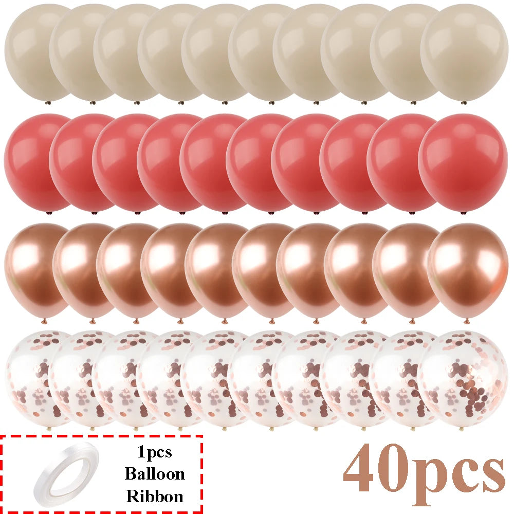 Ein Set von 40 matten Latexballons in verschiedenen Rosa- und Nude-Tönen mit einer Rolle Schleifgummi.