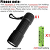 Black compact flashlight with a textured grip and a bright LED light head.