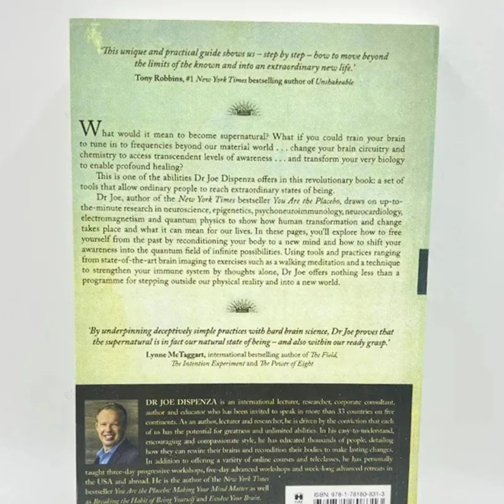 A book titled Becoming Supernatural by Tony Robbins featuring text about spiritual transformation and life changes.
