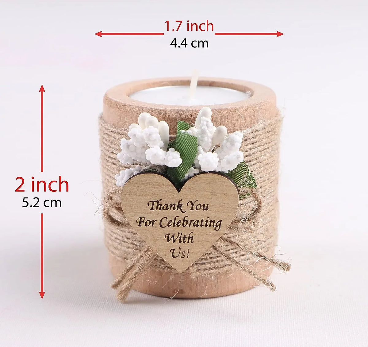 A natural wooden candle holder wrapped with twine features a heart-shaped wooden tag and white floral decorations.