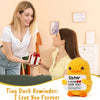 Handmade knitted yellow duck plush toy with an inspirational card