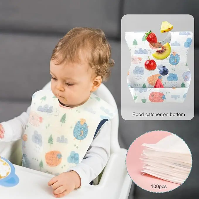 A baby is wearing a white bib with a food catcher pocket, next to a package of 100 disposable baby bibs.