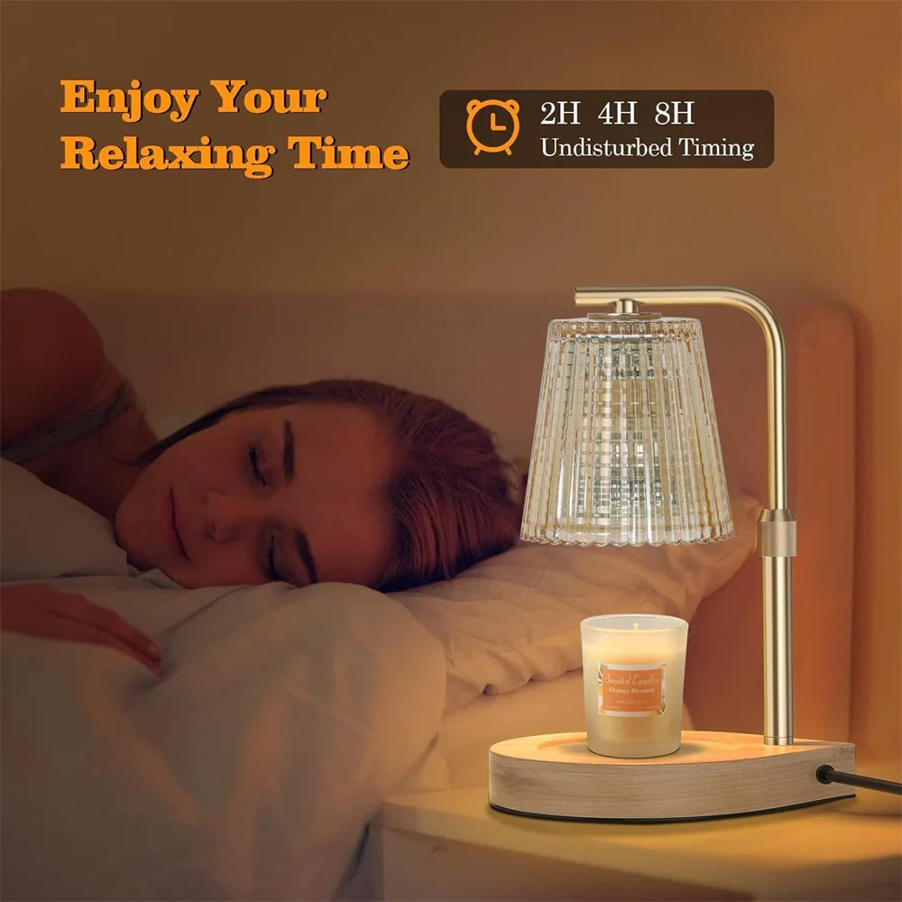 A bedside lamp with a glass shade and a candle on a wooden base, illuminating a woman relaxing in bed.