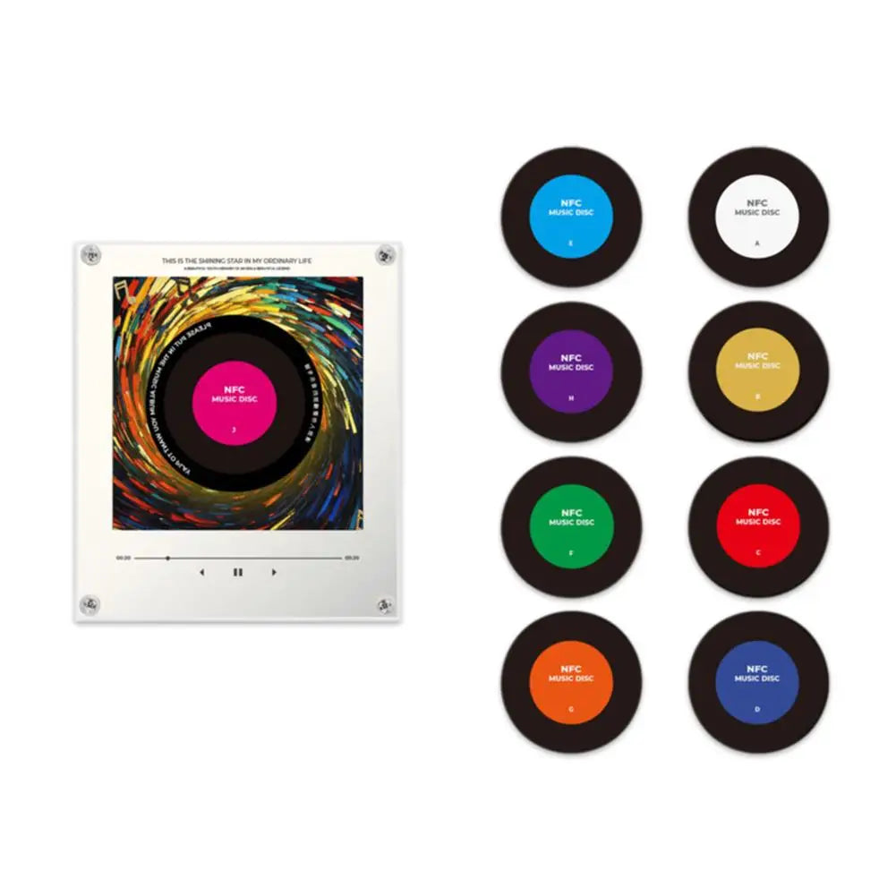 A collection of magnetic vinyl records with different colored LED glows arranged in a circle.