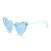 Light blue heart-shaped sunglasses embellished with small pearls