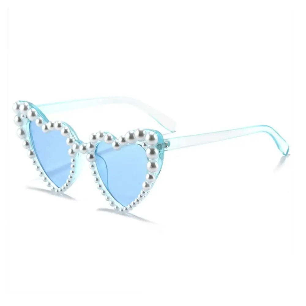 Light blue heart-shaped sunglasses embellished with small pearls