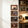 A vertical display of five rustic wooden photo frames featuring nature and portrait photography mounted on a white wall.