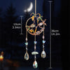 A hanging crystal tree of life sun catcher featuring gold wire and various colored crystals and leaves.