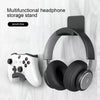 A black multifunctional headphone storage stand featuring over-ear headphones and a punch-free mounting mechanism.