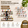 Black and white floating display shelves showcasing collectible figures on a wall