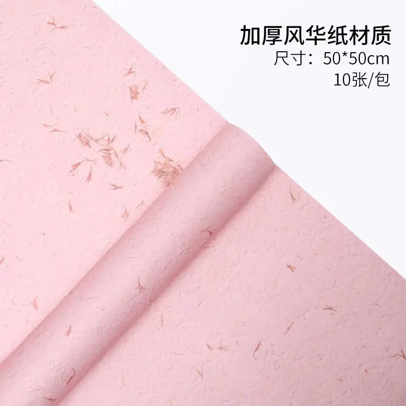 Roll of pink flower petal decorative packaging paper for gifts and weddings