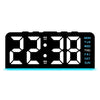 Reloj de alarma digital LED negro mostrando la hora 22:38 con brillo azul.