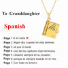 A gold pendant necklace shaped like an open book with a message for a granddaughter engraved on it.