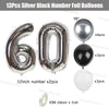 Silver and black number foil balloons including the number 60 and various sizes with ribbon