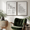 A framed print of Psalm 46 scripture art displayed on a wall next to a green velvet armchair and potted plant.