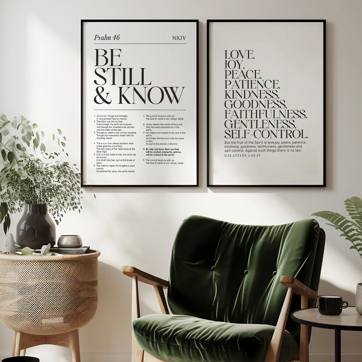 A framed print of Psalm 46 scripture art displayed on a wall next to a green velvet armchair and potted plant.