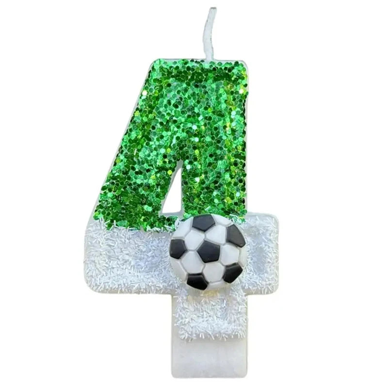 A birthday candle shaped like the number 4 covered in green glitter and featuring a soccer ball design.