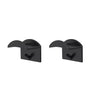 A pair of black no-drill adhesive hat hooks for wall storage.