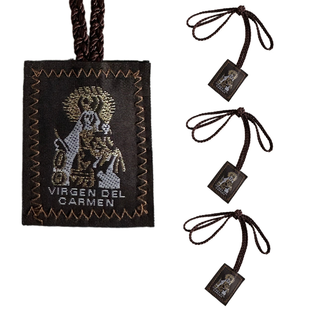 A set of multi-symbol Catholic pendant necklaces featuring a dark fabric tag and small charms.