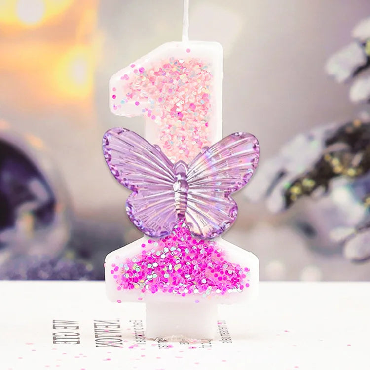 A birthday candle shaped like the number one made of pink glitter and purple iridescent confetti.