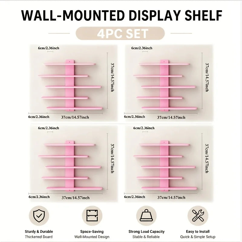 A set of four pink wall-mounted display shelves with wooden supports and various sizes for storage.