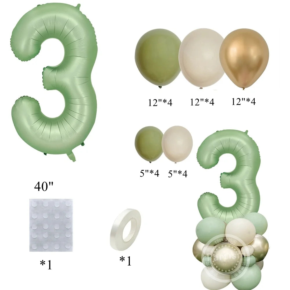 A set of vintage green and gold foil balloons shaped like the number three for birthday decor.