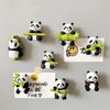 A collection of cute panda-themed fridge magnets featuring various expressions and accessories.