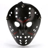 A realistic black horror mask with white eyeholes and red accents, shown from the front.