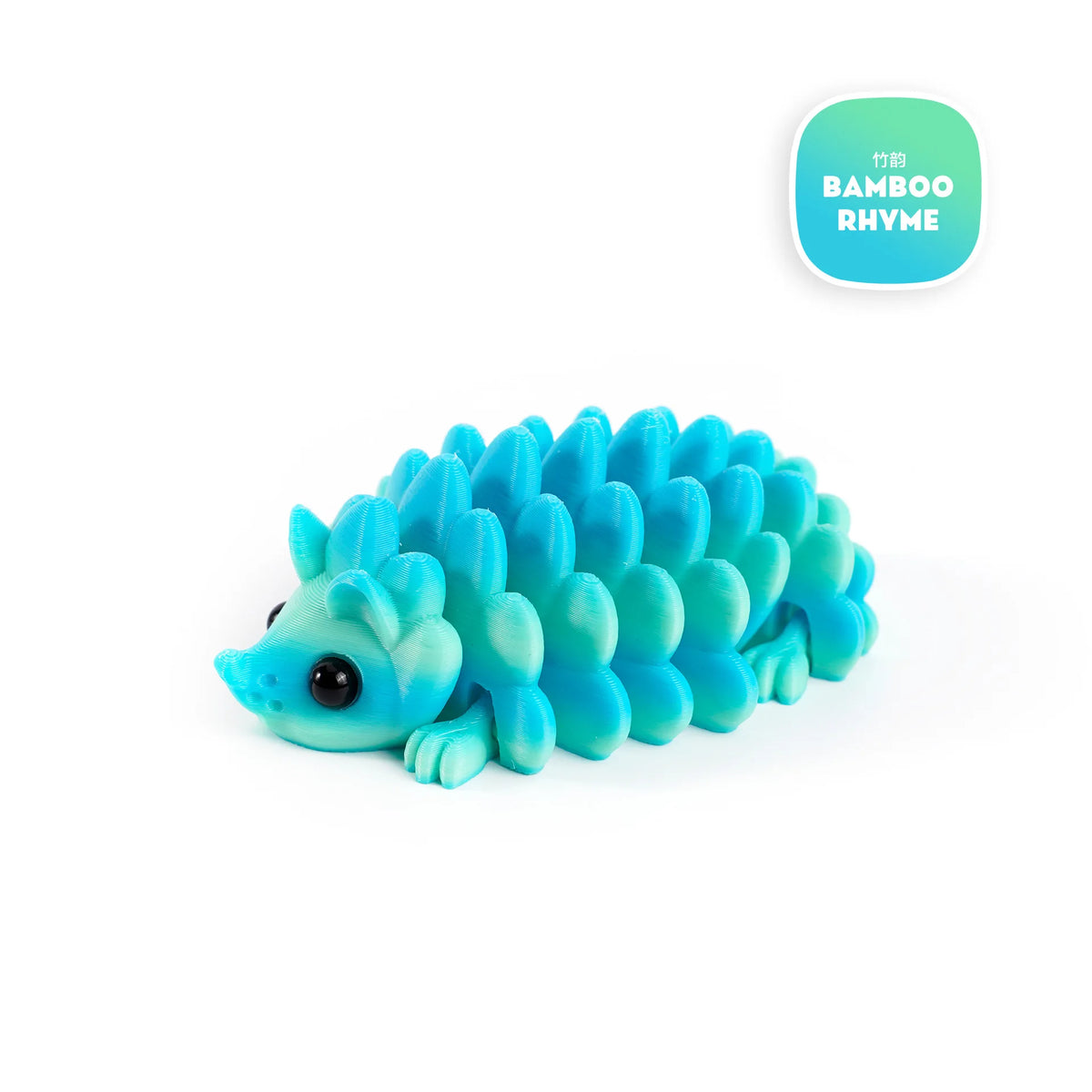 A bright blue articulated 3D printed hedgehog figurine with a cute face.