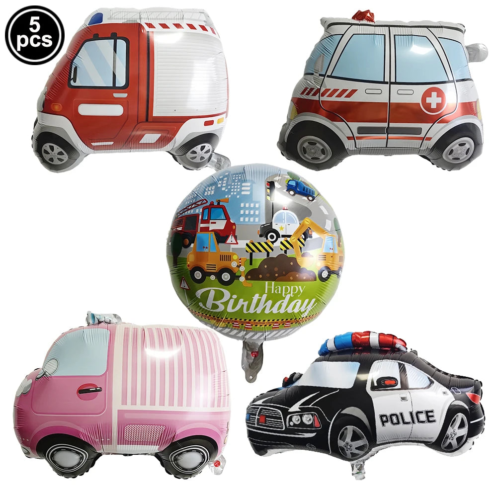 Five construction truck foil balloons for birthday party decor, including a red dump truck and a pink van.
