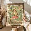 A framed canvas print featuring a vintage woodland mouse sitting on a large red and white mushroom surrounded by green foliag