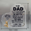 A clear heart-shaped glass sign engraved with a message to dad and featuring a deer antler design.