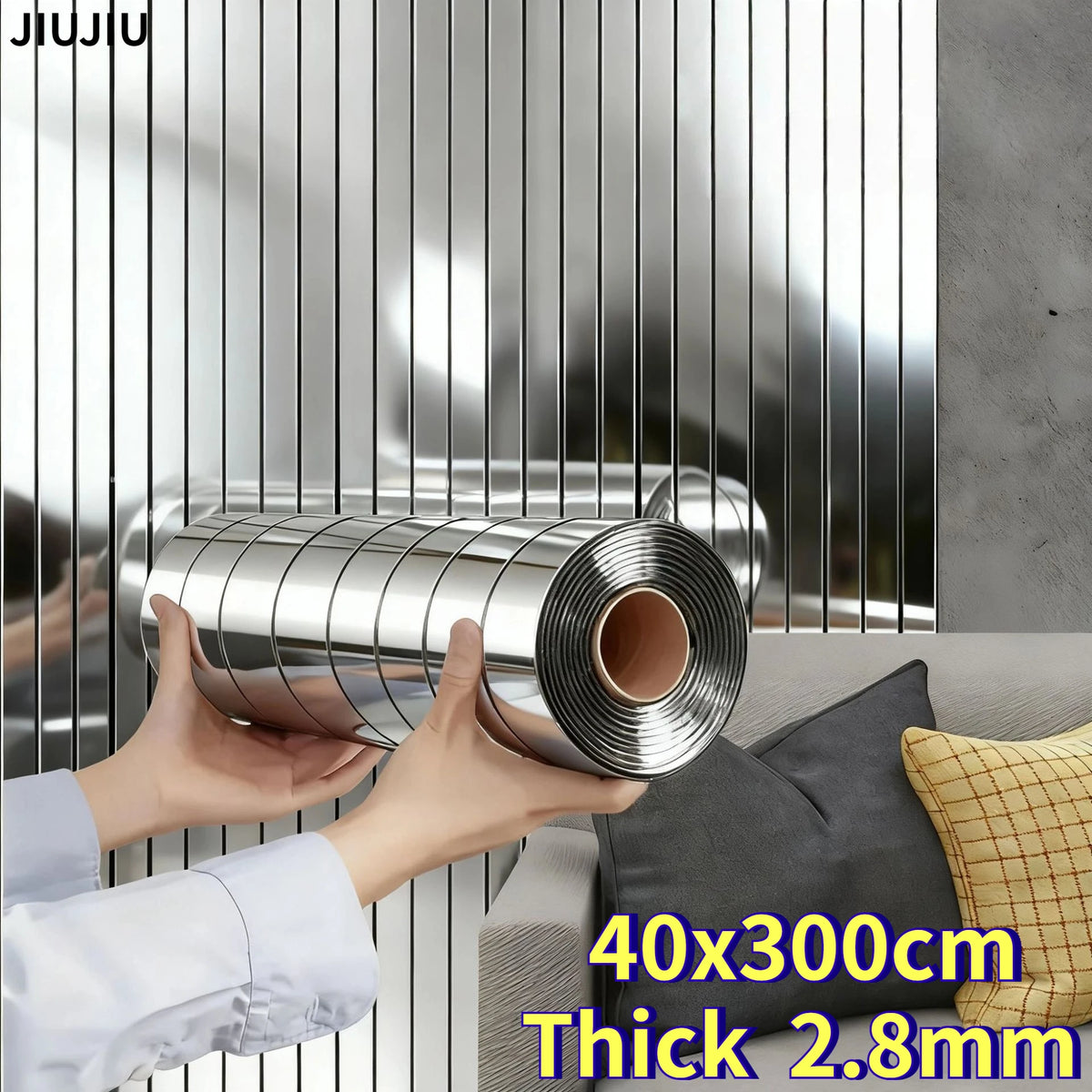 A hand is holding a cylindrical metal strip with a mirror effect finish against a vertical metallic background.