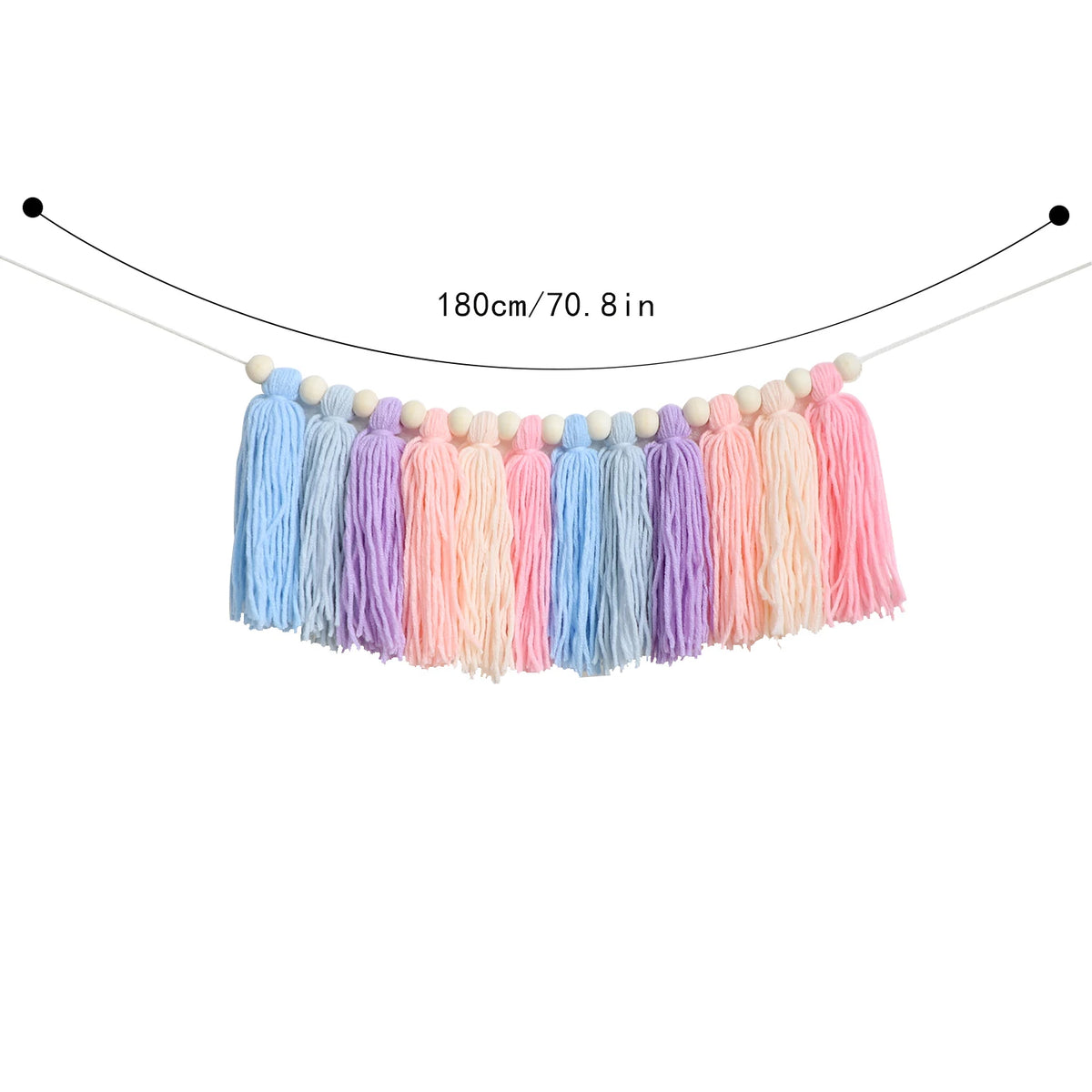 Handmade boho rainbow tassel garland featuring wooden beads in various pastel colors.