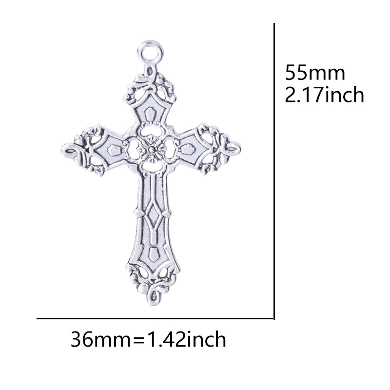 Silver cross charm with ornate detailing, measuring 55mm or 36mm.