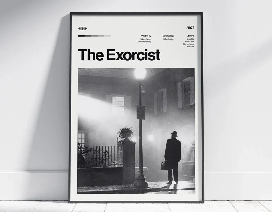 Black and white movie poster print titled The Exorcist displayed in a black frame.
