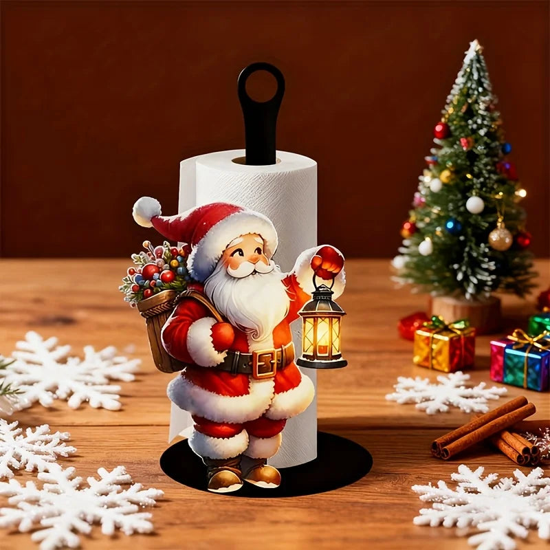 Santa Claus kitchen paper towel holder with festive design standing on a wooden surface surrounded by white snowflakes